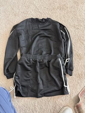 Black 2Piece Sweatshirt & Skort Set with White Trim and bow detail. Never worn